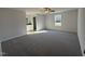 Spacious bedroom with ceiling fan and plush carpeting at 52 Faucette Dr, Selma, NC 27576