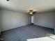 Bright bedroom featuring ceiling fan and carpet at 52 Faucette Dr, Selma, NC 27576