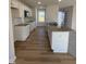 Modern kitchen featuring granite countertops and white cabinets at 52 Faucette Dr, Selma, NC 27576