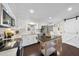 Spacious kitchen with white cabinets and granite countertops at 5705 Larchwood Dr, Raleigh, NC 27609