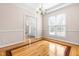 Formal dining room featuring hardwood floors and a chandelier at 6328 Nowell Pointe Dr, Raleigh, NC 27607