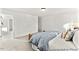 Main bedroom with ensuite bathroom access and carpet at 292 Nathan Dr # 46P, Lillington, NC 27546