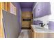 Bathroom under construction with purple walls and wood tile shower at 65 Soggy Bottom Trl, Zebulon, NC 27597