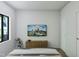 Bright bedroom with a city view and a modern media console at 711 E Lenoir St # 207, Raleigh, NC 27601