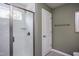 Bathroom with a walk-in shower, and a single window for natural light at 769 Denburn Pl, Raleigh, NC 27603