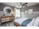Bright bedroom with a comfy bed, dresser, and large window at 769 Denburn Pl, Raleigh, NC 27603
