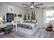 Charming bedroom featuring a tree mural and built-in drawers at 769 Denburn Pl, Raleigh, NC 27603