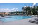 Inviting community pool with ample lounge chairs and umbrellas at 769 Denburn Pl, Raleigh, NC 27603