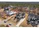 New construction home in a neighborhood featuring a driveway and manicured front lawn at 8001 Wexford Waters Ln, Wake Forest, NC 27587