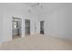Bedroom features a ceiling fan, neutral carpet, and access to closet and bath at 8001 Wexford Waters Ln, Wake Forest, NC 27587