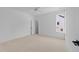 Bright bedroom with neutral carpet, large window, and access to an en-suite bathroom at 8001 Wexford Waters Ln, Wake Forest, NC 27587