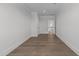 Bright hallway features hardwood floors and an open view into another room at 8001 Wexford Waters Ln, Wake Forest, NC 27587