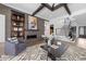 Stylish living room with fireplace, modern decor, beautiful staircase and open floor plan at 8001 Wexford Waters Ln, Wake Forest, NC 27587