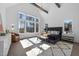 Inviting main bedroom with vaulted ceiling, accent beams and large windows showcasing wooded views at 8001 Wexford Waters Ln, Wake Forest, NC 27587