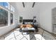 Inviting main bedroom with vaulted ceiling, accent beams and large windows showcasing wooded views at 8001 Wexford Waters Ln, Wake Forest, NC 27587