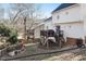 Spacious backyard with deck, firepit, and mature trees at 1006 Silent Retreat Ln, Knightdale, NC 27545