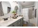 Modern bathroom with double vanity and shower/tub combo at 1006 Silent Retreat Ln, Knightdale, NC 27545