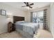 Cozy bedroom with window and ceiling fan at 1006 Silent Retreat Ln, Knightdale, NC 27545
