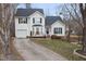 Two-story house with attached garage and landscaped yard at 1006 Silent Retreat Ln, Knightdale, NC 27545