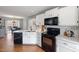 Open kitchen with stainless steel appliances and an island at 1006 Silent Retreat Ln, Knightdale, NC 27545