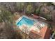 Community swimming pool with surrounding wooded area at 1006 Silent Retreat Ln, Knightdale, NC 27545