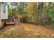 Deck and stairs leading to a wooded backyard at 125 Havencrest Lndg, Garner, NC 27529