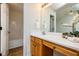 Bathroom with vanity, mirror, and shower/tub combo at 125 Havencrest Lndg, Garner, NC 27529