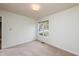 Bright bedroom with neutral walls and carpeting at 125 Havencrest Lndg, Garner, NC 27529