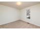 Bright bedroom with neutral walls and carpeting at 125 Havencrest Lndg, Garner, NC 27529