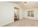Main bedroom with ceiling fan, window, and ensuite bathroom at 125 Havencrest Lndg, Garner, NC 27529