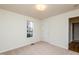 Bright bedroom with neutral walls and carpeting at 125 Havencrest Lndg, Garner, NC 27529