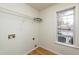 Laundry room with shelving and window at 125 Havencrest Lndg, Garner, NC 27529