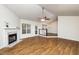 Spacious living room with hardwood floors, fireplace and access to dining area at 125 Havencrest Lndg, Garner, NC 27529