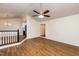 Living room with hardwood floors, vaulted ceiling and access to kitchen at 125 Havencrest Lndg, Garner, NC 27529