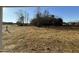 View of the backyard from the covered patio at 128 Pate Landing Dr, Selma, NC 27576