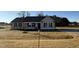 Newly built single-story home with landscaping at 128 Pate Landing Dr, Selma, NC 27576