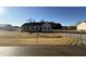 New construction home with gray siding and a black roof at 128 Pate Landing Dr, Selma, NC 27576