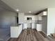 Modern kitchen with white cabinets and granite counters at 128 Pate Landing Dr, Selma, NC 27576