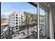 View from balcony features city and treetop views at 1300 St Marys St # 403, Raleigh, NC 27605