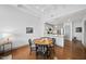 Cozy dining area with hardwood floors, perfect for enjoying meals with friends and Gathering at 1300 St Marys St # 403, Raleigh, NC 27605