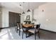 Community dining room with large table and chairs at 1300 St Marys St # 403, Raleigh, NC 27605