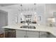 Kitchen features island with sink and breakfast bar seating at 1300 St Marys St # 403, Raleigh, NC 27605
