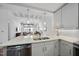 Modern kitchen featuring granite counters, stainless steel appliances, and open concept design at 1300 St Marys St # 403, Raleigh, NC 27605