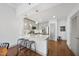 Modern kitchen with breakfast bar and stainless steel appliances at 1300 St Marys St # 403, Raleigh, NC 27605