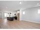 Open kitchen boasts stainless steel appliances, large island, and modern cabinetry at 1364 Barreto Dr, Wendell, NC 27591