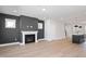 Living room with fireplace flows into kitchen island at 1364 Barreto Dr, Wendell, NC 27591