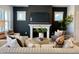 Comfortable living room showcases a cozy fireplace, modern furniture, and natural light at 1364 Barreto Dr, Wendell, NC 27591