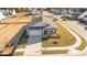 Aerial view of a gray house and yard in a new development at 14 Baird Cv Ln, Angier, NC 27501