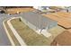 Aerial view of a gray house and yard in a new development at 14 Baird Cv Ln, Angier, NC 27501