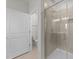 Clean bathroom with shower, toilet, and storage at 14 Baird Cv Ln, Angier, NC 27501
